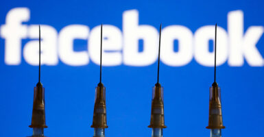 Facebook logo and vaccines