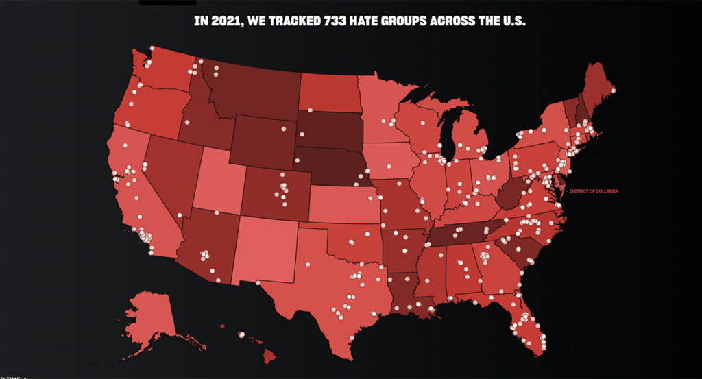 A map of the United States in red with SPLC-accused "hate groups" in white