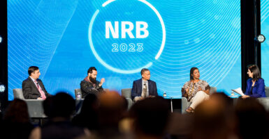 National Religious Broadcasters Logo in blue behind five people dressed in suits