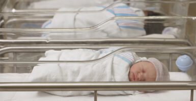 Newborn babies sleeping in hospital nursery