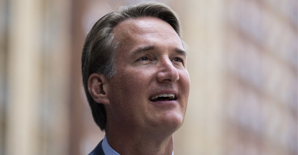 Virginia Governor Glenn Youngkin smiles