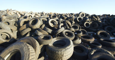 A large pile of used tires
