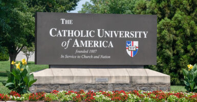 Catholic University of America sign with a crest reading "founded 1887"