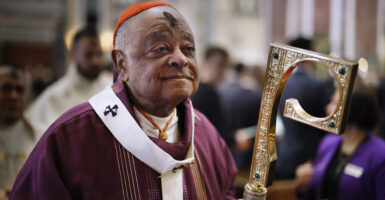 With a cross of ash on his forehead, Cardinal Wilton Gregory, archbishop of Washington, leads the recession of the Mass on Ash Wednesday at the Cathedral of St. Matthew the Apostle on February 22, 2023 in Washington, DC. (Photo by Chip Somodevilla/Getty Images)