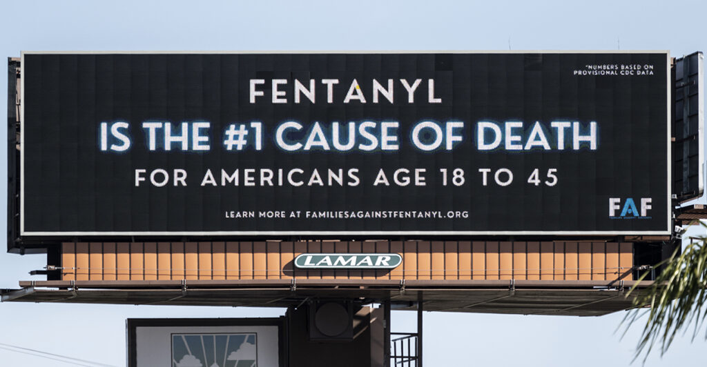 A billboard says fentanyl is the number one cause of death for Americans ages 18 to 45