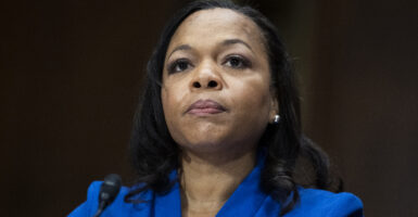 Kristen Clarke in a blue top