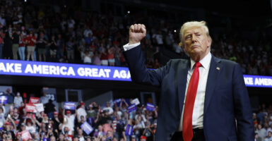 GRAND RAPIDS, MICHIGAN - JULY 20: Republican presidential nominee, former U.S. President Donald Trump walks offstage after speaking at a campaign rally at the Van Andel Arena on July 20, 2024 in Grand Rapids, Michigan. (Photo by Anna Moneymaker/Getty Images)