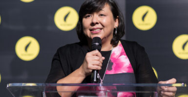 Margaret Huang in a black dress