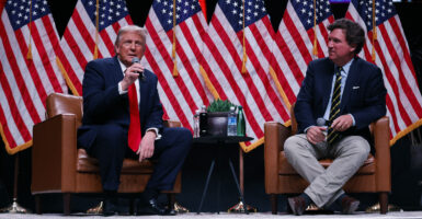 Trump and Tucker talk on stage in Arizona