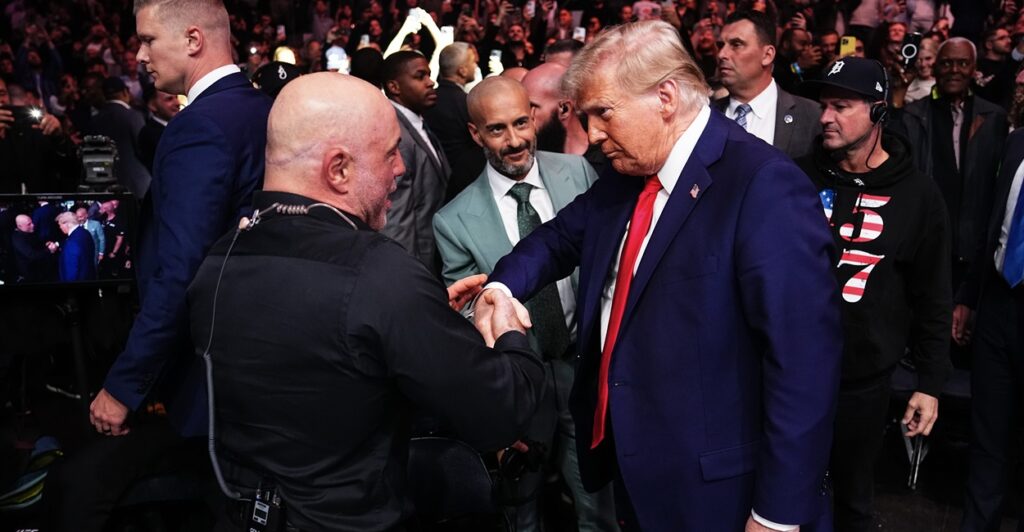 Podcaster Joe Rogan shakes the hand of President-elect Donald Trump at a UFC fight.