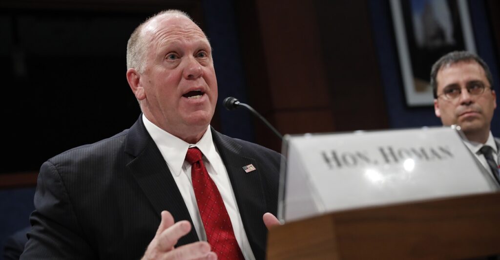 Thomas Homan, President Donald Trump's selection to be the border czar, testifies at a Congressional hearing wearing a red tie.