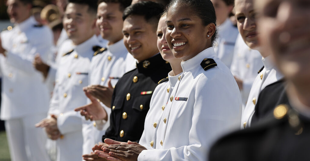 Midshipmen at the U.S. Naval Academy applaud during a May 24 graduation ceremony in Annapolis, Maryland.