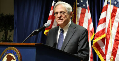 Attorney General Merrick Garland behind a lectern