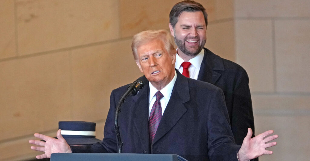 President Donald Trump delivers remarks Monday in Emancipation Hall of the Capitol as Vice President JD Vance looks on during inauguration ceremonies.