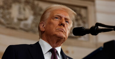 President Donald Trump scowls resolutely