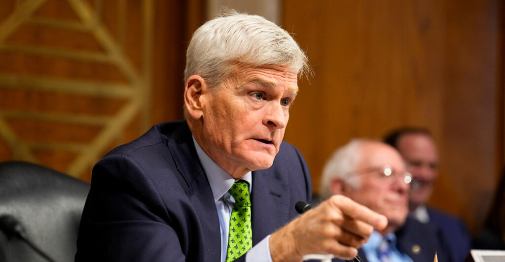 Bill Cassidy in a suit with a yellow tie