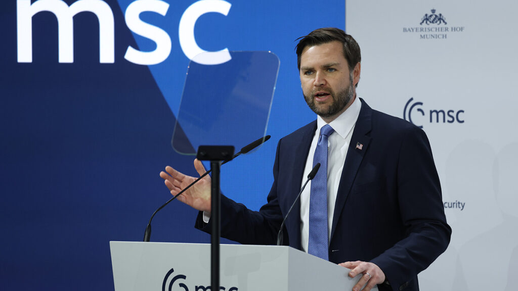 JD Vance speaks in a blue suit