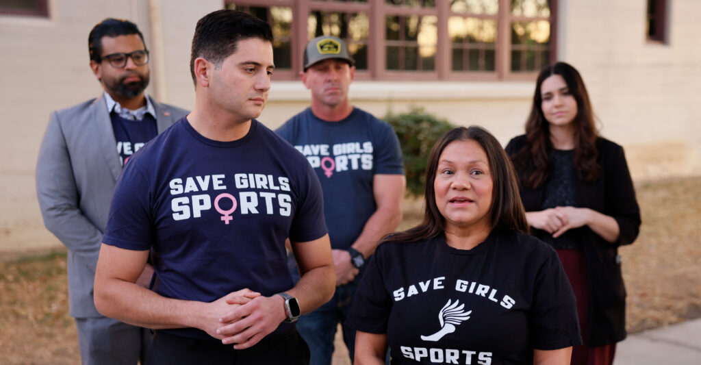California Assembly members Bill Essayli and Leticia Castillo and their supporters wearing "Save girls sports" T-shirts