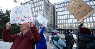 Activists protest to "stop the Musk coup" outside the Office of Personnel Management in Washington on Monday.