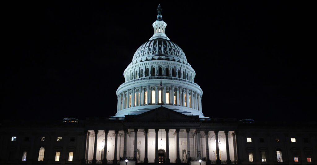 The U.S. Capitol lit up against the night sky
