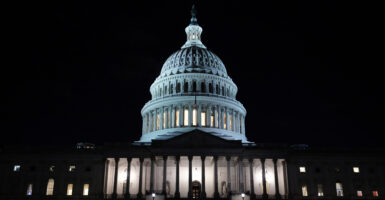 The U.S. Capitol lit up against the night sky