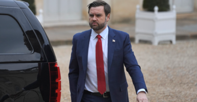 Vice President JD Vance in white shirt and red tie