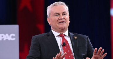 James Comer in a suit sitting at CPAC