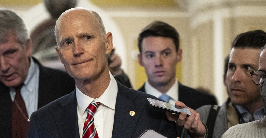Sen. Rick Scott, R-Fla., answers questions from reporters.