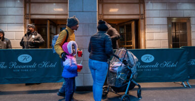 Illegal immigrants arrive at the Roosevelt Hotel in midtown Manhattan in New York City