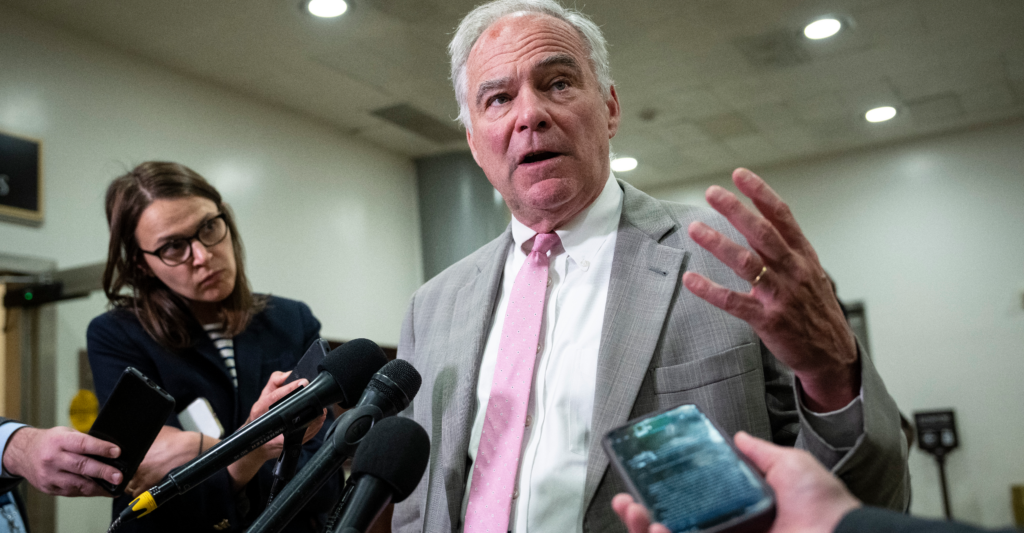 Sen. Tim Kaine, D-Va., talks to reporters.