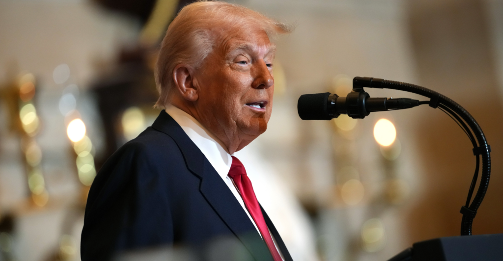 President Donald Trump addresses the annual National Prayer Breakfast at the Capitol.
