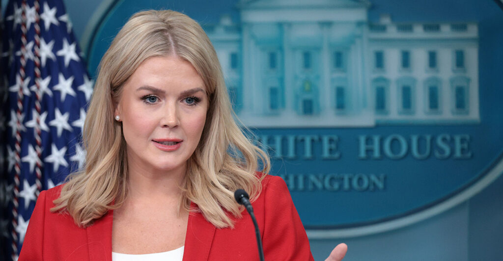 Trump press secretary Karoline Leavitt with the White House logo behind her