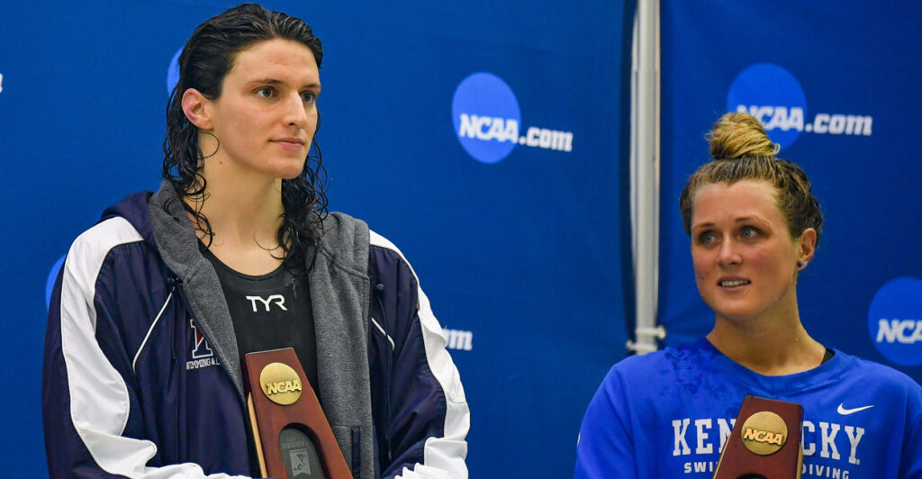 Transgender college swimmer Lia Thomas and female swimmer Riley Gaines hold their NCAA awards after competing against one another