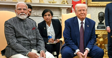 President Donald Trump confers with Indian Prime Minister Narendra Modi at the White House on Thursday.