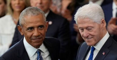 Former Presidents Barack Obama and Bill Clinton attend the Inauguration of President Donald Trump in the Capitol Rotunda on Jan. 20.