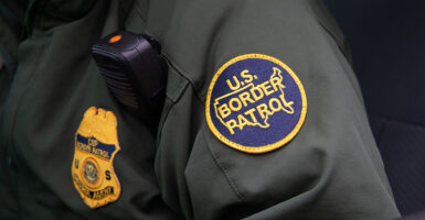 A Border Patrol patch on an agent's uniform