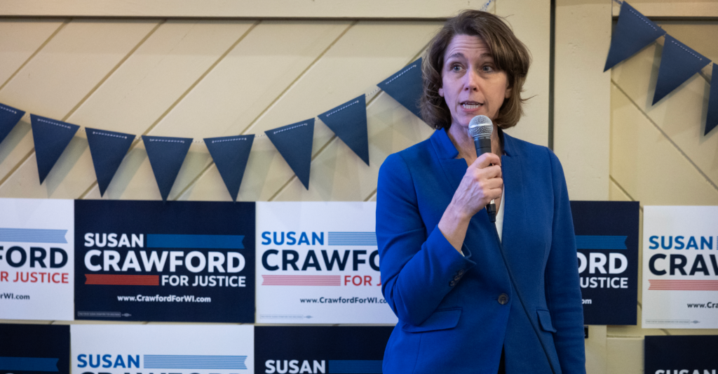 Backed by Democrats, Wisconsin Supreme Court candidate Susan Crawford speaks to supporters on Sunday in Racine, Wis.
