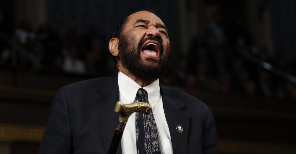 Rep. Al Green, D-Texas, shouts in protest as President Donald Trump addresses a joint session of Congress at the Capitol on Tuesday night.