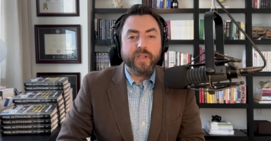 Josh Hammer in a dress shirt and sport coat