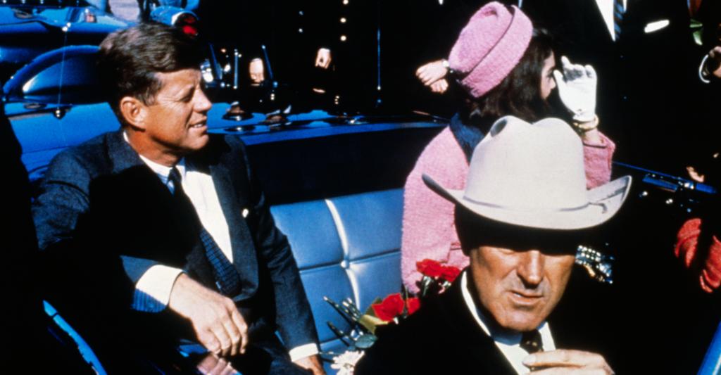 President John F Kennedy, first lady Jacqueline Kennedy, and Texas Gov. John Connally ride in a motorcade in Dallas, Texas, on the day of Kennedy's Nov. 22, 1963, assassination.