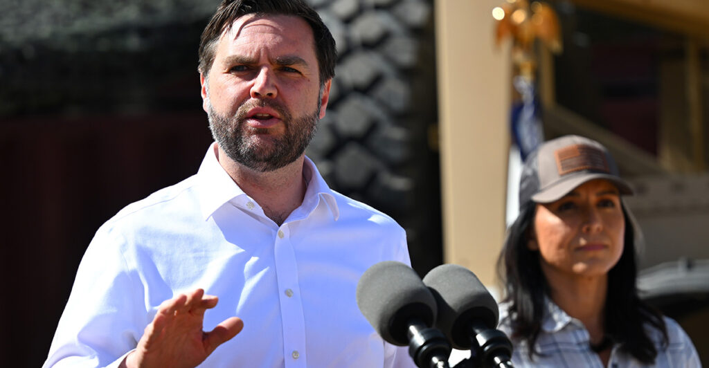 Vice President JD Vance speaks to reporters as Director of National Intelligence Tulsi Gabbard looks on during a visit to the U.S.-Mexico border in Eagle Pass, Texas, on Wednesday.