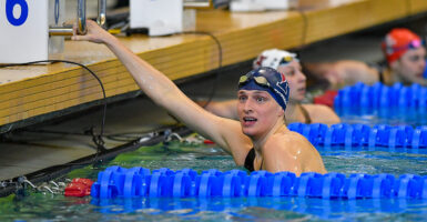 Then-University of Pennsylvania swimmer William "Lia" Thomas reacts after swimming the 100 Freestyle prelims at the NCAA Swimming and Diving Championships on March 19, 2022.