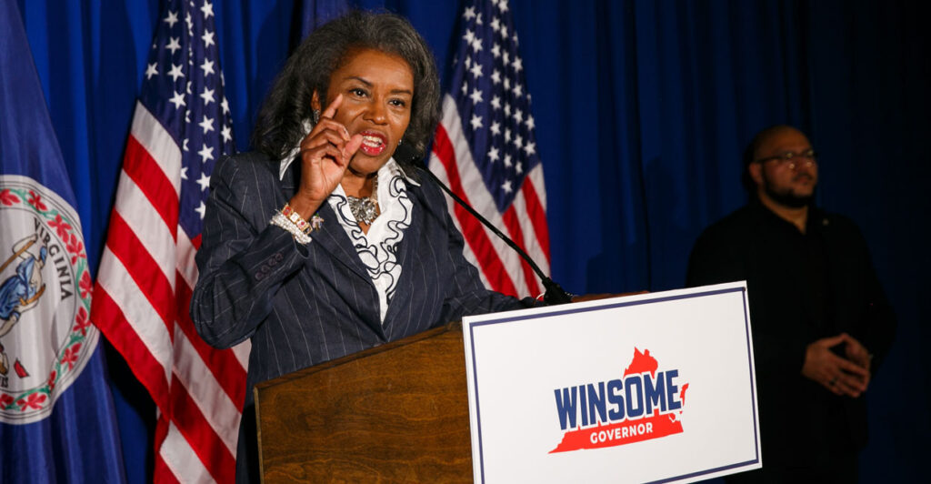 Virginia Lieutenant Governor Winsome Sears speaks emphatically at a podium at a campaign event as she campaigns for governor