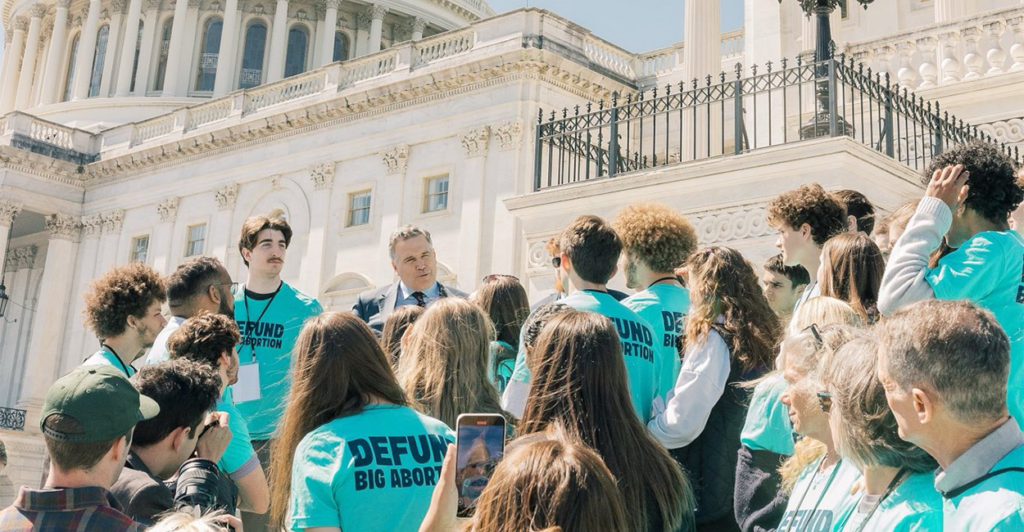 Members of the coalition Defund Planned Parenthood gather outside the Capitol on Thursday.