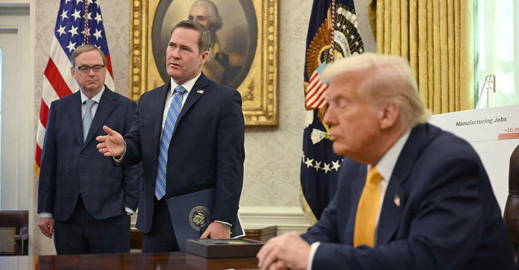 President Donald Trump listens to National Security Adviser Mike Waltz (center) on Friday.