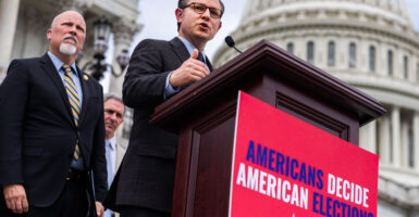 House Speaker Mike Johnson, R-La., holds a May 8, 2024, news conference outside the Capitol with Rep. Chip Roy, R-Texas (left), looking on.