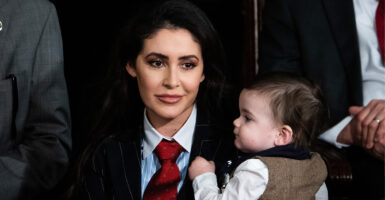 Rep. Anna Paulina Luna, R-Fla., is seen with her young son in the House chamber on Jan. 3.