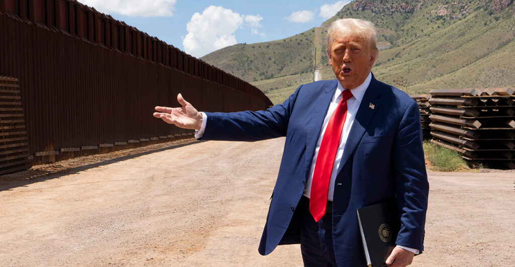 Then-presidential candidate Donald Trump walks along the U.S.-Mexico border south of Sierra Vista, Ariz., on Aug. 22, 2024.