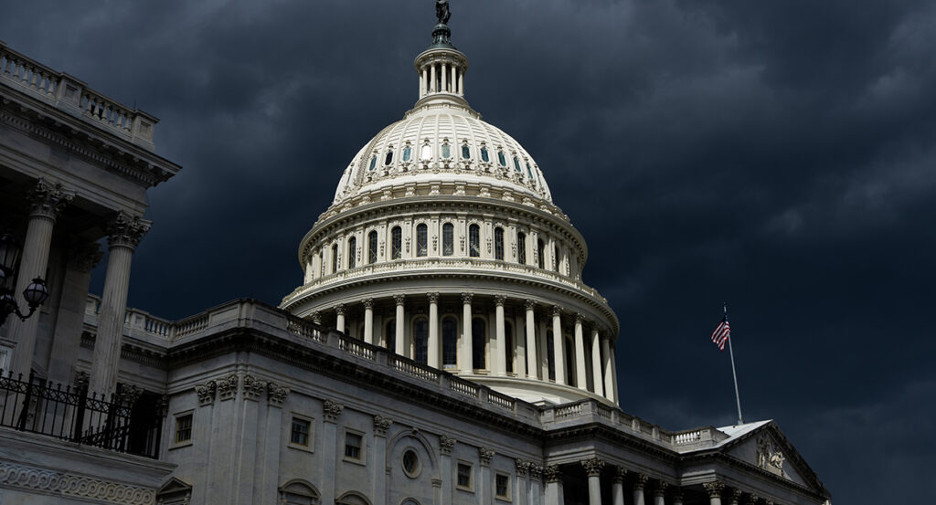 The U.S. Capitol building with clouds