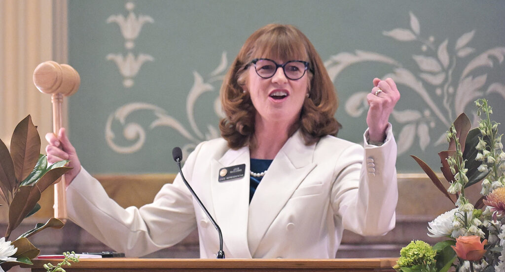 Julie McCluskie in white